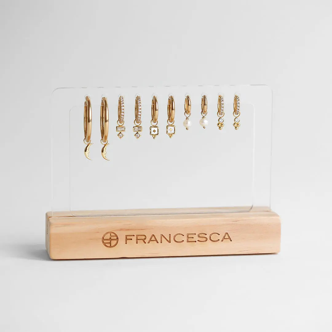 The    Franc Wooden Earring Stand by  Francesca Jewellery from the Accessories Collection.