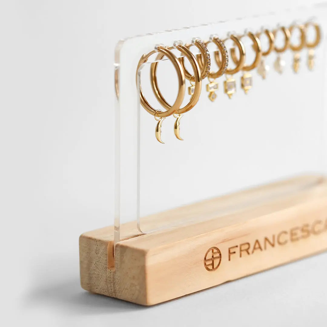 The    Franc Wooden Earring Stand by  Francesca Jewellery from the Accessories Collection.