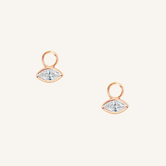 rose gold hoop charms inspired by the Louvre's architecture with Marquise cut white cubic zirconia bezel set on white background