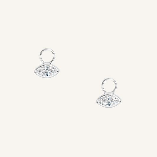 silver hoop charms inspired by the Louvre's architecture with Marquise cut white cubic zirconia bezel set on white background