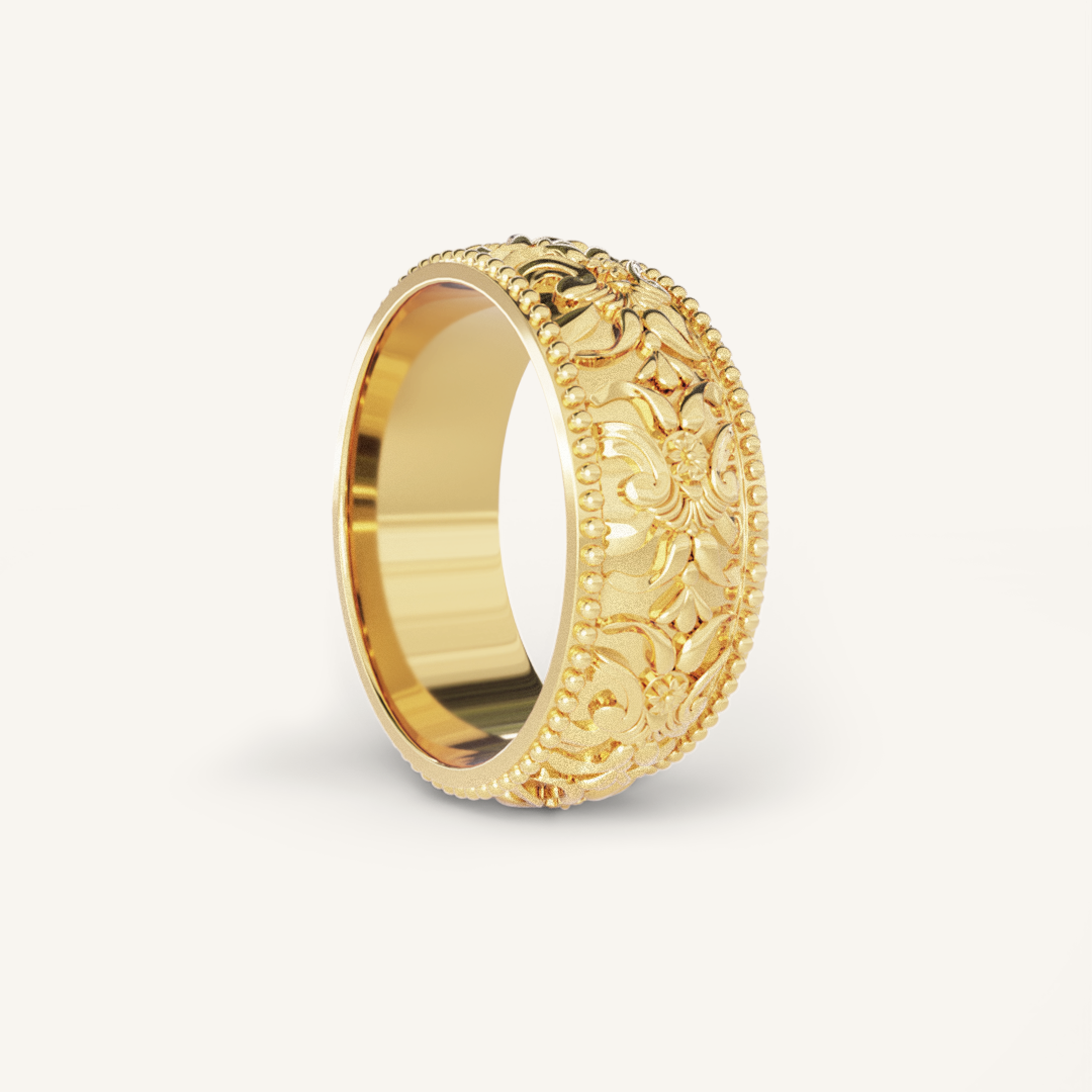 intricately designed statement gold ring inspired by Paris on white background