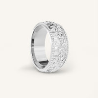 intricately designed statement silver ring inspired by Paris on white background