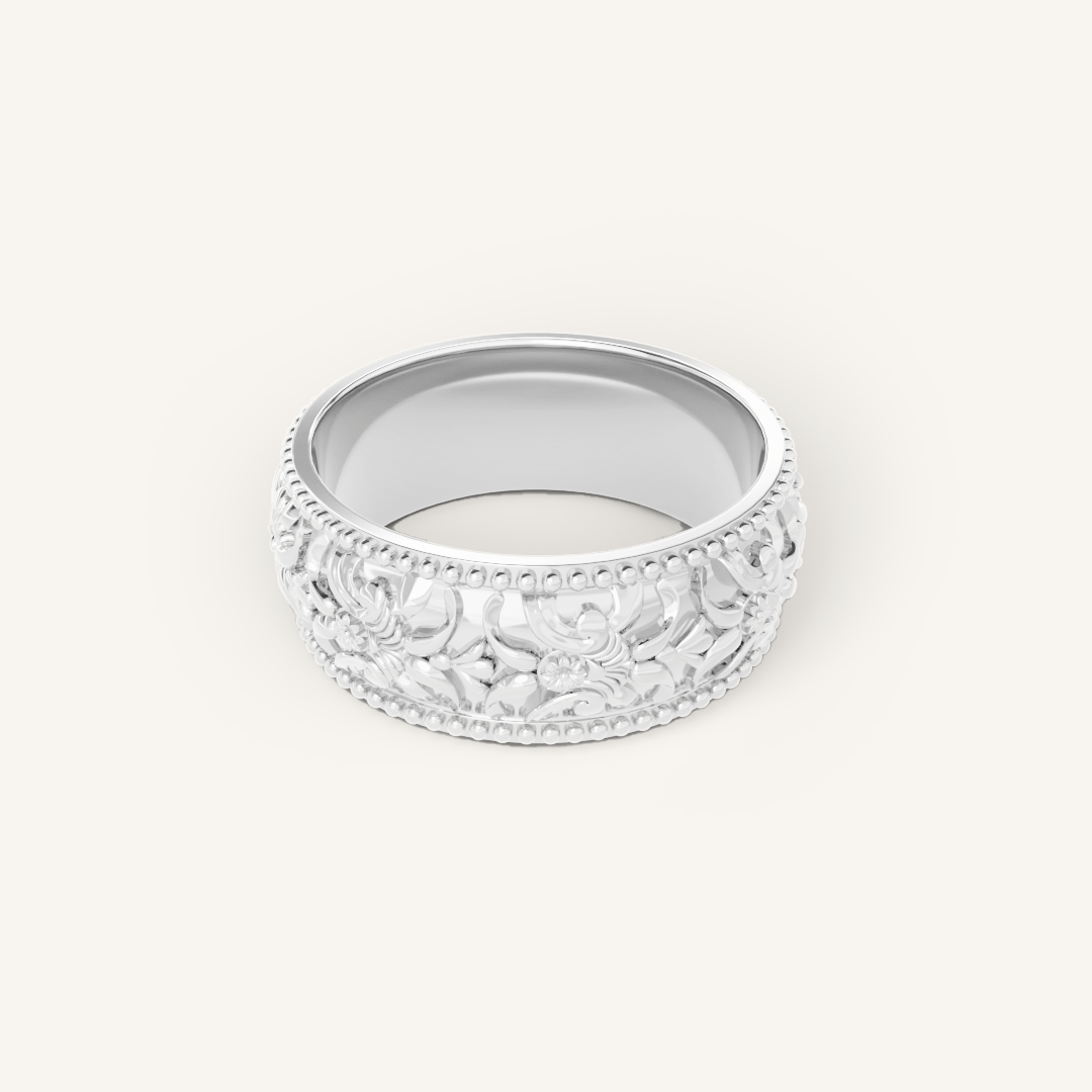 intricately designed statement silver ring inspired by Paris on white background